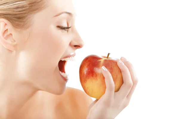 Woman with apple Royalty Free Stock Images