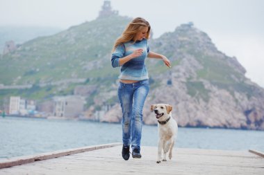 Girl with dog running clipart