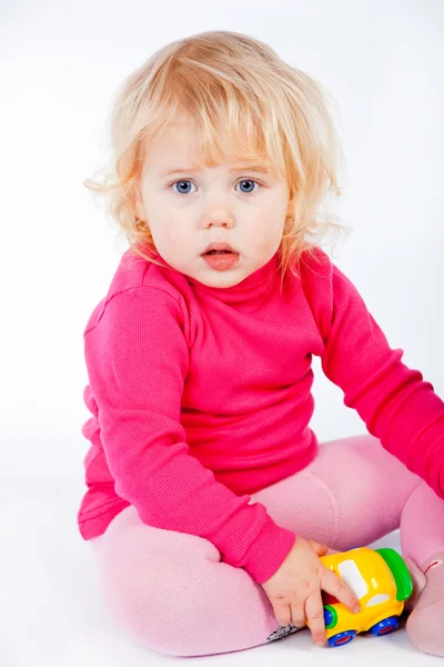 Bebé niña con juguete —  Fotos de Stock