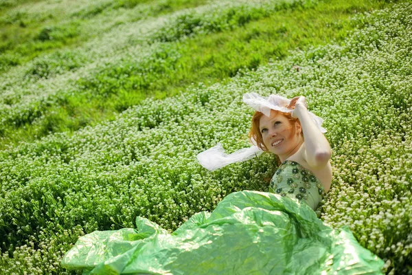 Girl resting in grass — Stock Photo, Image