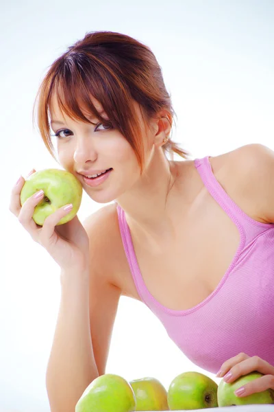 Cute teenage girl with apples — Stock Photo, Image