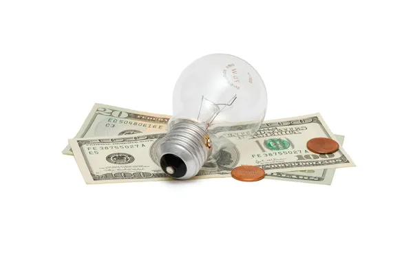 Lâmpada elétrica com dólares — Fotografia de Stock
