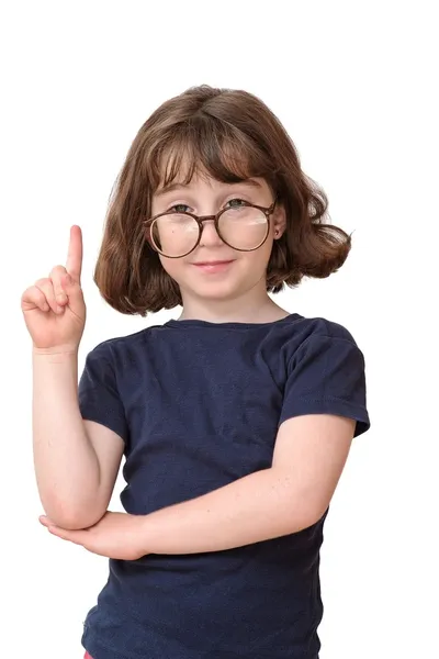 Menina em óculos levantando o dedo — Fotografia de Stock