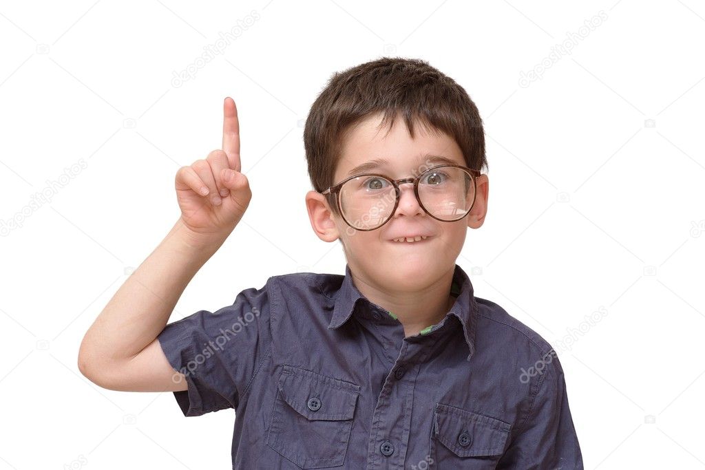 Little boy in round spectacles raising finger