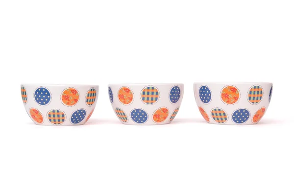 Row of three porcelain bowls isolated — Stock Photo, Image