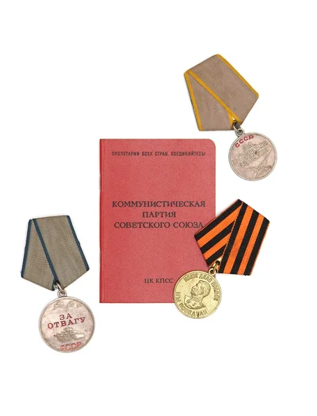 Soviet communist card surrounded by old medals — Stock Photo, Image
