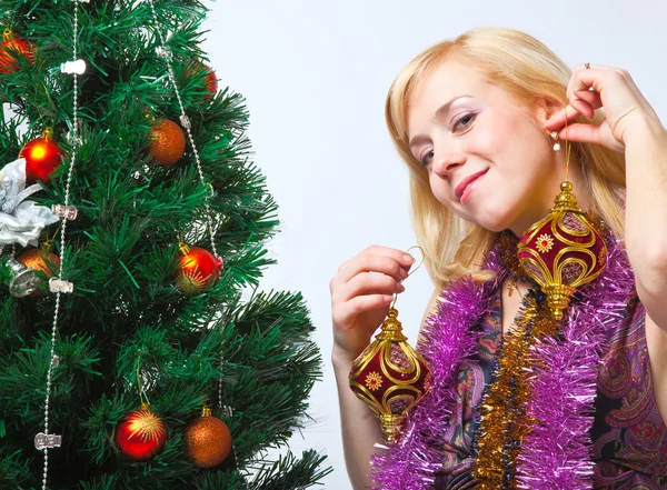 Girl near Christmas fir tree — Stock Photo, Image