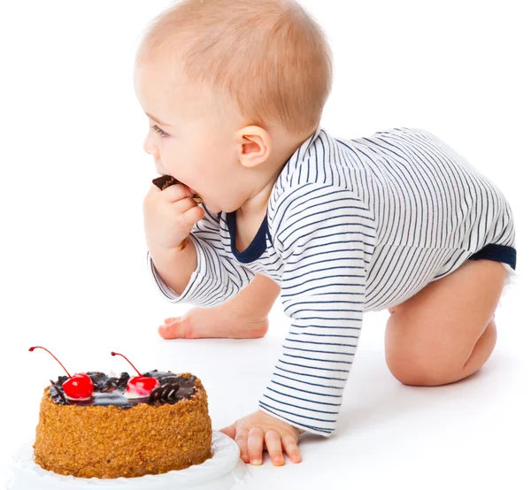 Младенец и торт — стоковое фото