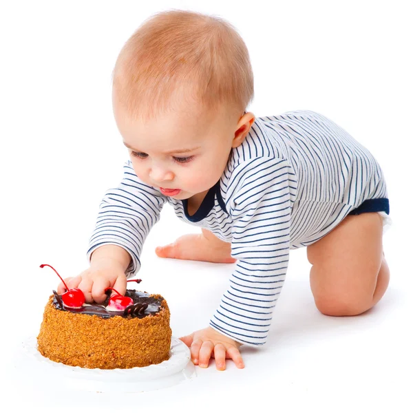 Младенец и торт — стоковое фото