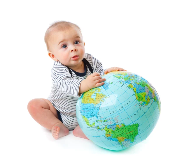 Ребенок и глобус — стоковое фото