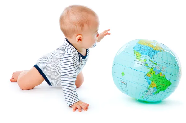 Baby en globe — Stockfoto