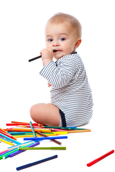 Bébé avec crayons — Photo