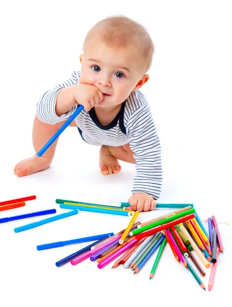 Baby mit Bleistiften — Stockfoto
