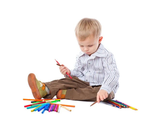 Kind met potloden — Stockfoto
