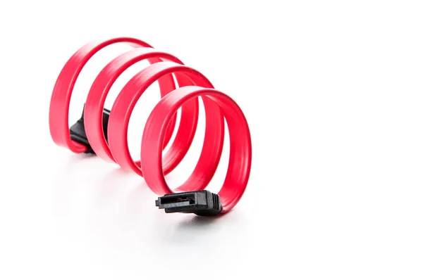 Red SATA cable twisted in spring — Stock Photo, Image