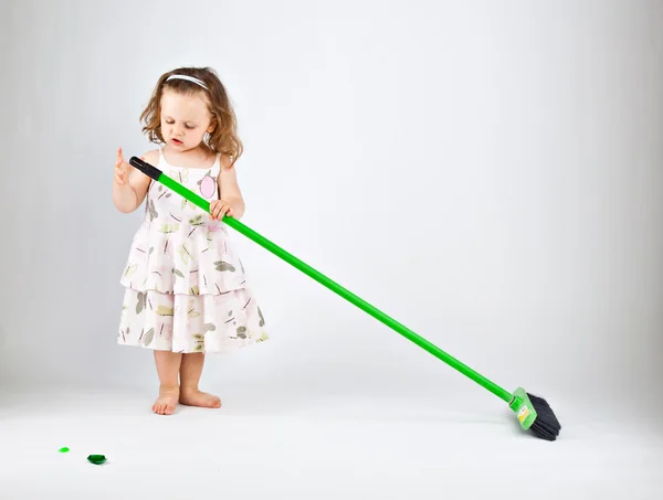 Little girl with mop — Stock Photo, Image