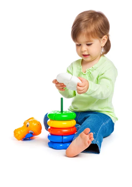 Holčička s hračkami — Stock fotografie