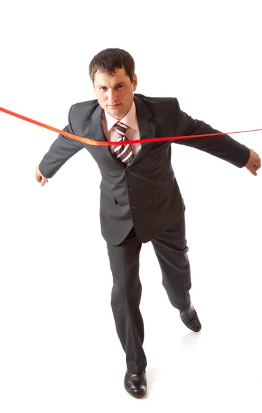 Biznesmen i czerwoną wstążką. na białym tle — Zdjęcie stockowe