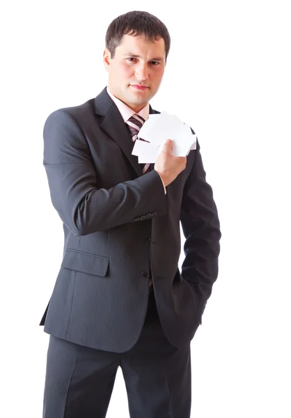 Бизнесмен с карточкой. Изолированный на белом фоне — стоковое фото