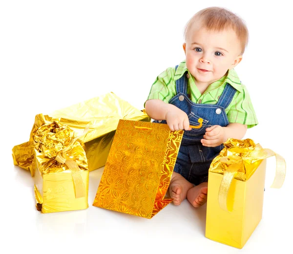 Baby mit Geschenken — Stockfoto