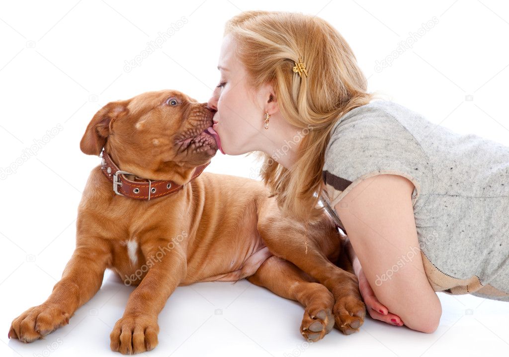 Young girl with puppy of Dogue de Bordeaux (French mastiff)