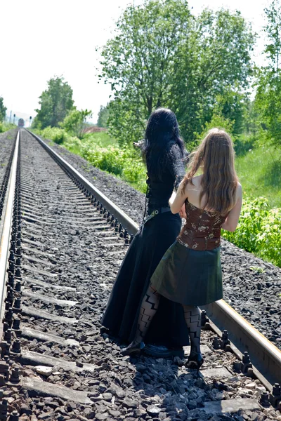 Two girls on railway — Stock Photo, Image