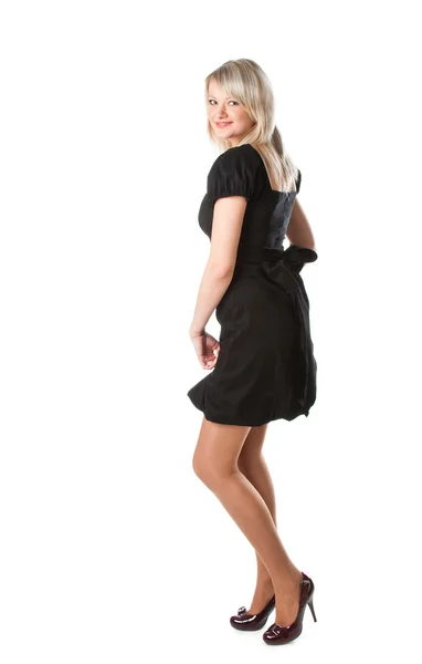 Blond ung kvinna i svart klänning — Stockfoto