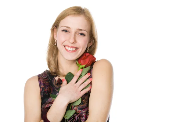 Молодая женщина с розой — стоковое фото