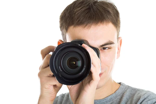 Jovem fotógrafo com câmera — Fotografia de Stock