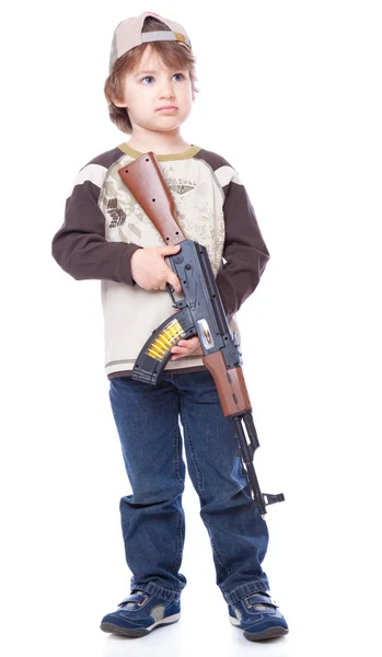 Portrait of little boy with automatic weapon (Kalashnikov) — Stock Photo, Image