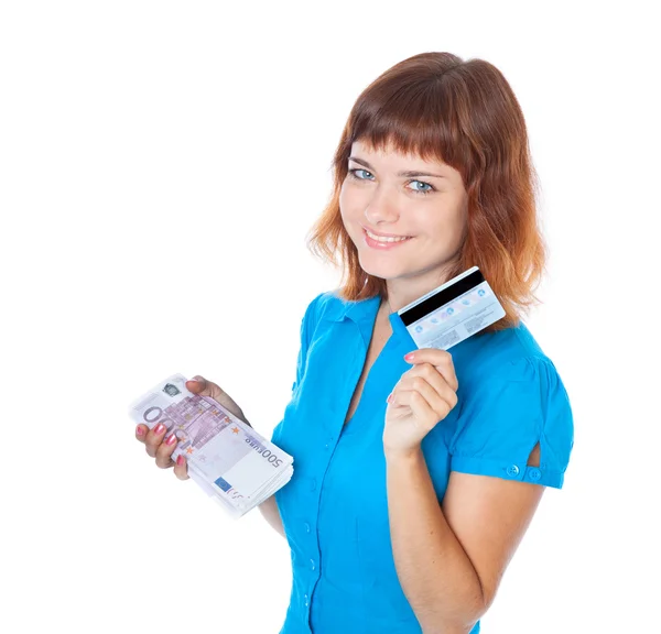 The red-haired young girl with a credit card and a bundle of ban — Stock Photo, Image