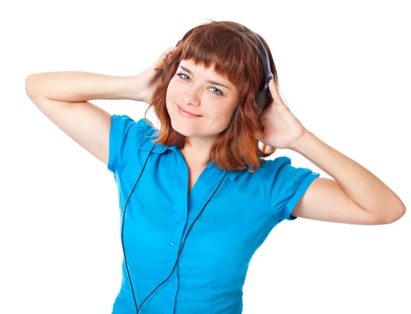 Młoda rudowłosa dziewczyna słuchać muzyki i tańca — Zdjęcie stockowe