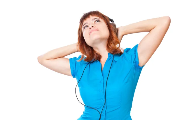 Fiatal vörös hajú lány hallgatni zene és tánc — Stock Fotó