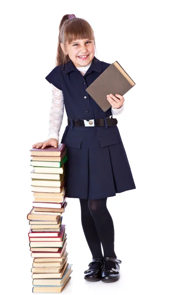 Schoolgirl with books is looking up — Stock Photo, Image