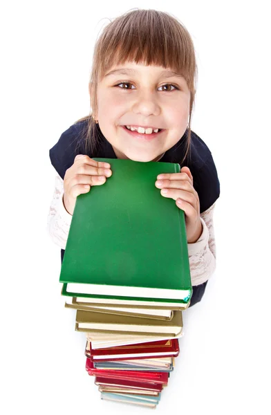 Schoolgirl with books is looking up — Stock Photo, Image