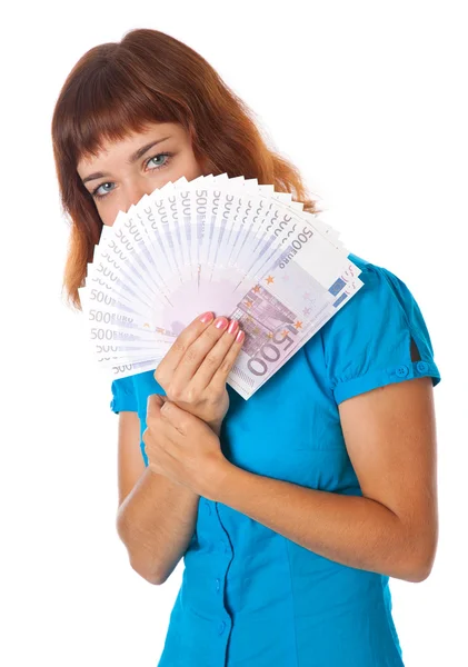 Egy lány pénzt tartja a kezében — Stock Fotó