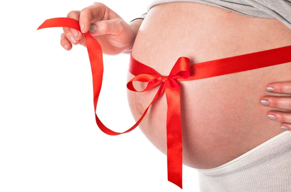 Una pancia di donna incinta — Foto Stock