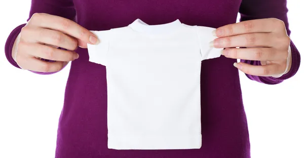 Eine Frau Hält Ein Kleines Weißes Shirt Der Hand Isoliert — Stockfoto