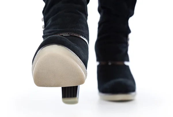 Kadın Çizme Yakın Çekim Bacaklar Beyaz Bir Arka Plan Üzerinde — Stok fotoğraf