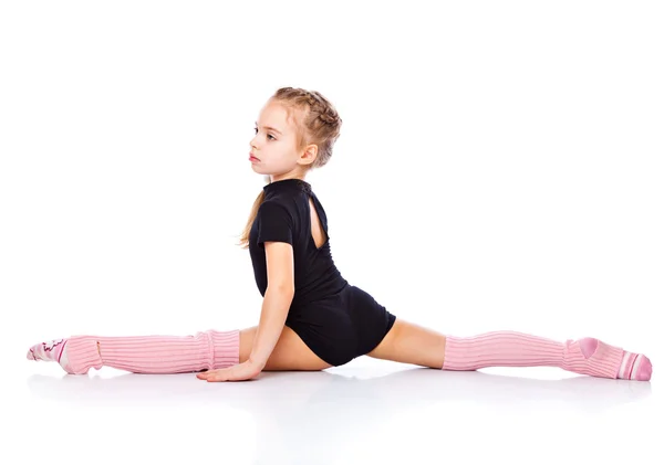 Una ragazza è impegnata in acrobazie — Foto Stock