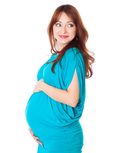 En gravid leende ung kvinna — Stockfoto