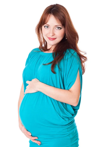 En gravid leende ung kvinna — Stockfoto
