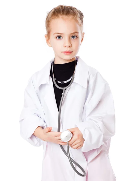 Uma menina está vestida como médica — Fotografia de Stock