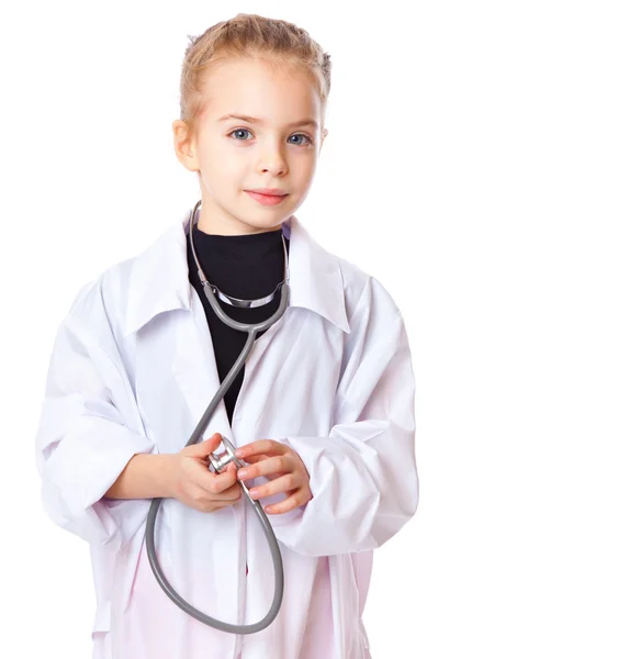 Una chica está vestida de médico. — Foto de Stock