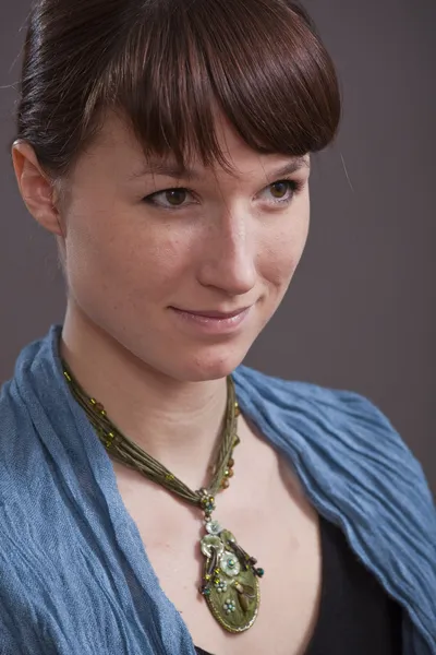 Portrait of woman with amulet — Stock Photo, Image