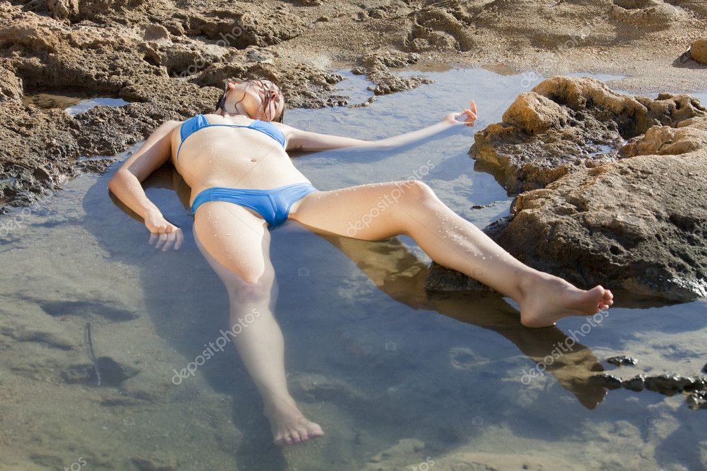 Unconscious woman in water — Stock Photo © eddiephotograph #2893322