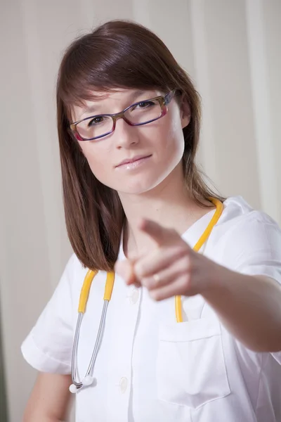 Doctor pointing with finger — Stock Photo, Image