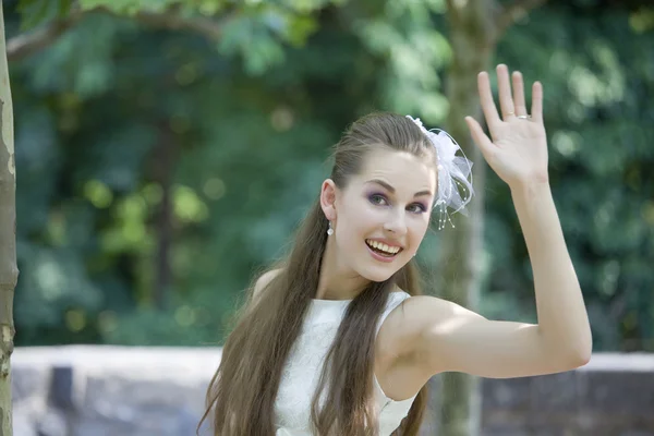 Young bride waving with hand — Stock Photo, Image