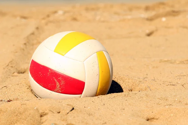 Volleyball in sand — Stock Photo, Image