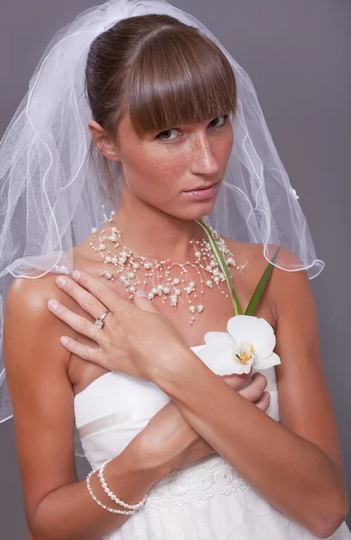 Sad bride with flower — Stock Photo, Image